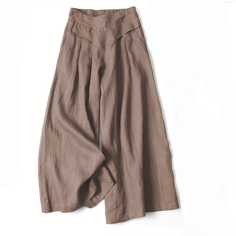 Braune Damen-Leinenhose mit weitem Bein, hoher Taille und Falten. Modische Sommerhose, ideal für lässige Outfits und warme Tage.