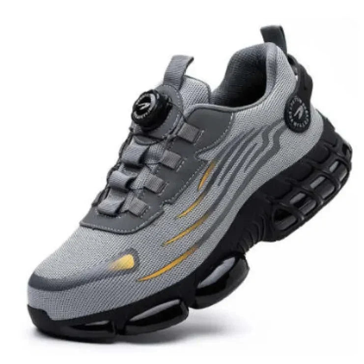 Grauer Sportschuh mit innovativer Sohle, atmungsaktivem Mesh-Obermaterial und modernem Design. Ideal für Laufen und Fitness.