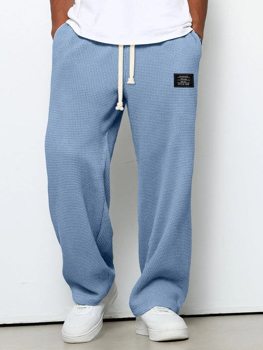 Men's Wide-Leg Pants with Adjustable Waistband and Side Pockets